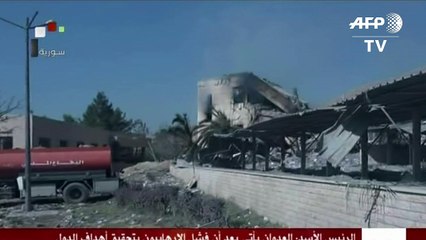 La TV syrienne montre un centre touché par une frappe