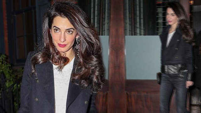 Amal Clooney keeps it trendy in black wool and leather coat while enjoying girls' night out in New York.