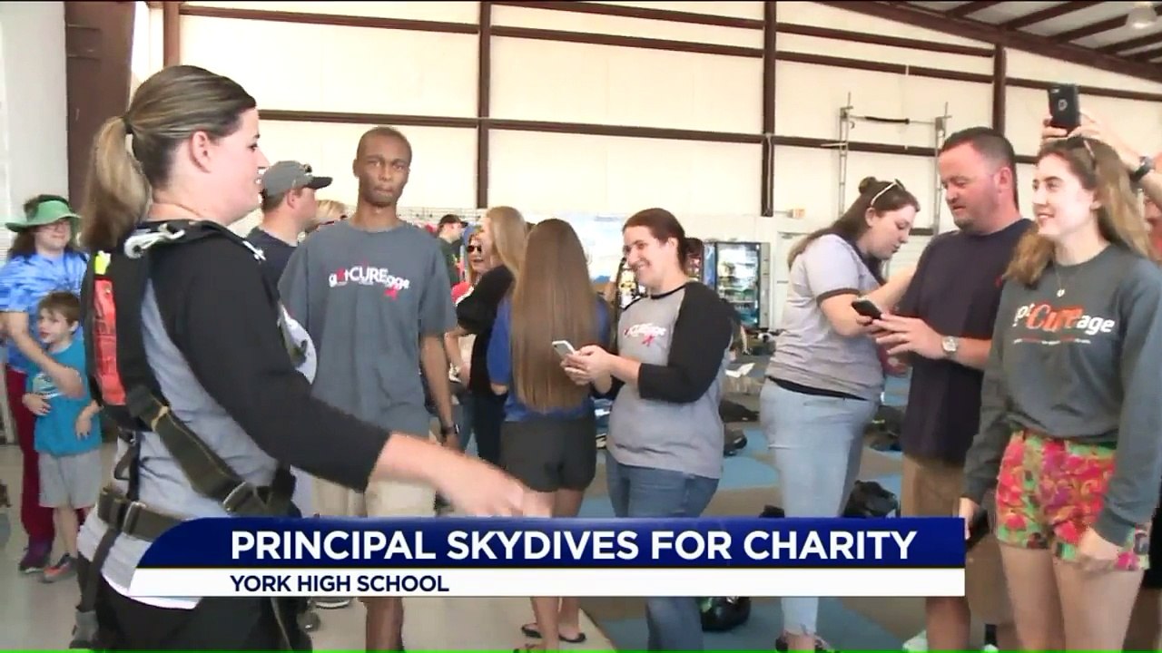Principal Follows Through with Promise to Skydive After Students Raise Thousands for Charity
