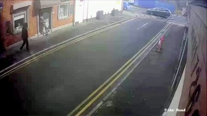CCTV footage shows notes landing on the road after a hapless robbery.