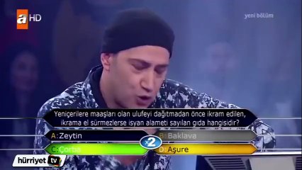 Kim Milyoner Olmak İster&#39;de 15 bin lira kazanan yarışmacı, ödülünü 9 kardeşini okutan Hakkarili şehit subayın ailesine bağışladı