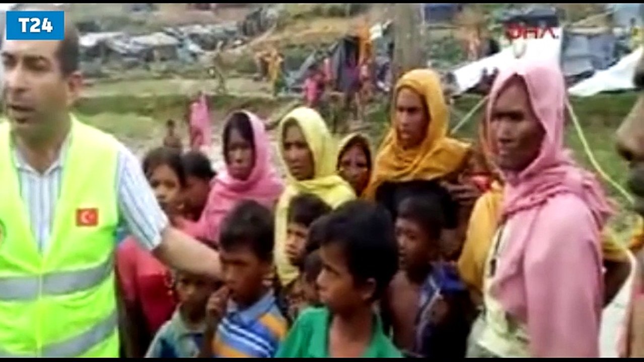 Sınırı geçmeyi başaran Arakanlı müslümanlara, Türk yardım kuruluşlarından gıda yardımı