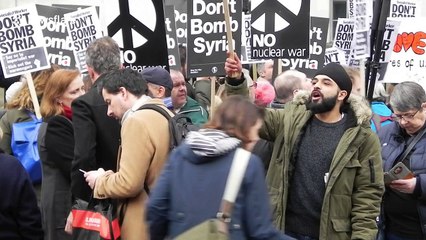 Scores protest outside Downing Street against Syria air strikes