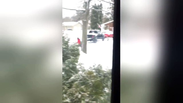 Commuters take to urban skiing after heavy Spring snowfall in Wisconsin