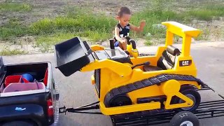 Playing With His Power Wheel Ride On Kid Trax Bulldozer, Chevy Silverado and Custom Tilt Trailer