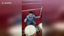Watch this 1-year-old playing the drums like a pro