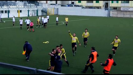 Impartial? Hardly! Clumsy linesman slips up while celebrating goal