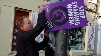 Watch: men caught tearing down pro-abortion posters in Ireland