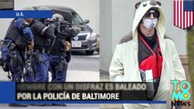 Hombre usando un disfraz y una bomba falsa es baleado por policías de Baltimore