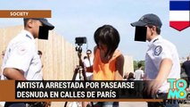 Artista Milo Moire arrestada en Paris por posar desnuda en la Torre Eiffel junto a turistas