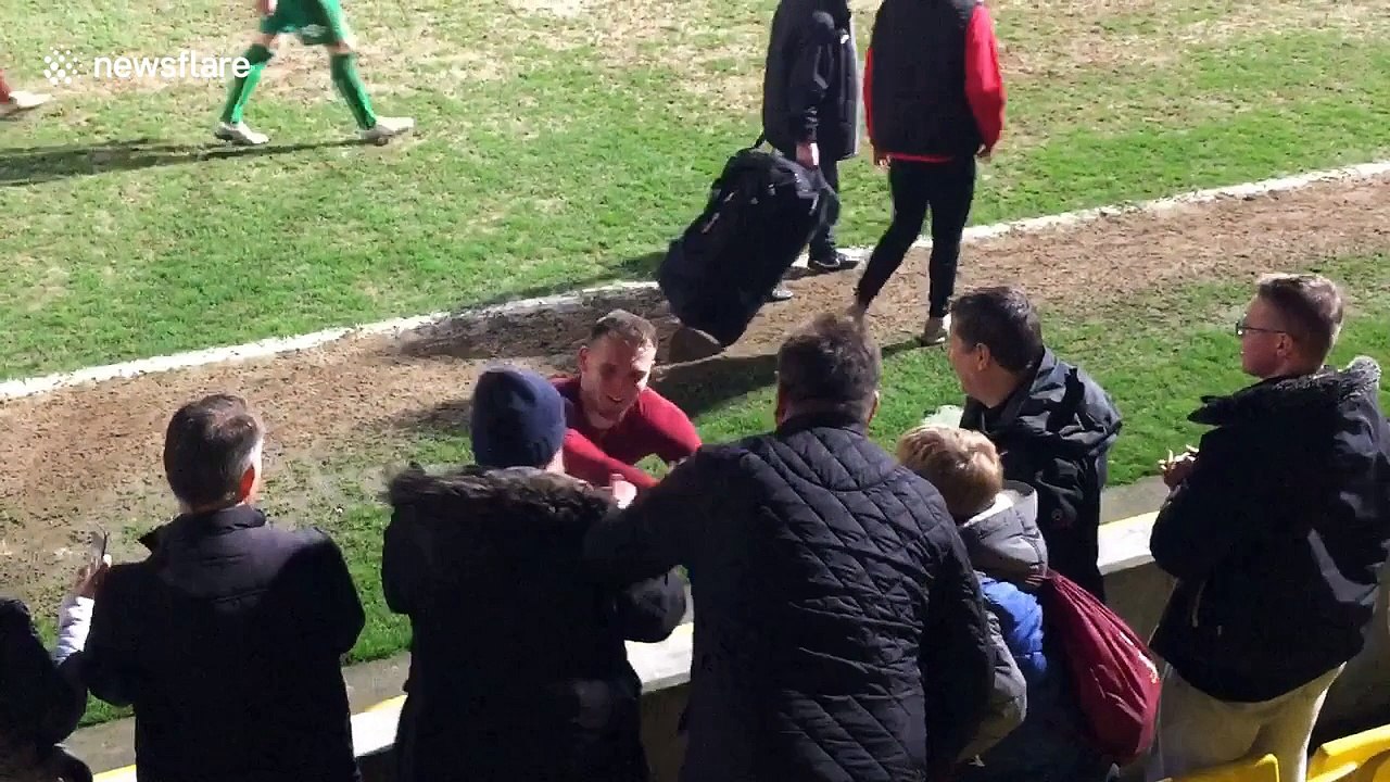Footballer gives away shirt to young fan he accidentally hit with errant ball