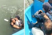 Heroic auxiliary cop jumps off Penang bridge to rescue woman