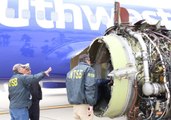 Aviation Safety Crew Inspects Grounded Southwest Plane After Fatal Incident