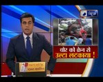 बिहार: दरभंगा में एक चोर को क्रेन से उल्टा लटकाया