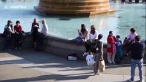 Londoners enjoy the sun in Trafalgar Square as mini heatwave hits UK