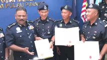 Three policemen receive award after saving woman who jumped off Penang bridge