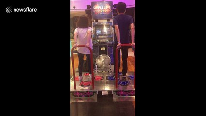 Couple's coordinated dance moves while playing game will mesmerize you
