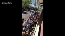 100 students fill sidewalk in gun violence protest in California