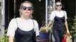 Miley Cyrus looks effortlessly cool in a white top and black slip dress for casual shopping day in Studio City