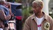 Jaden Smith takes time out of a PDA with girlfriend Odessa Adlon to check his phone.