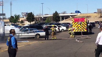 Burning Car in Parking Lot