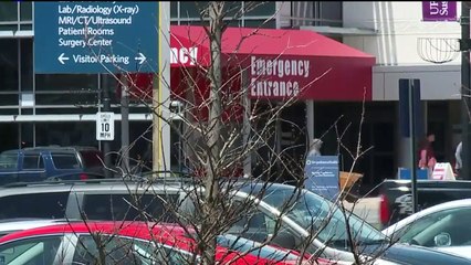 Viral Photo Shows Officer Helping Elderly Man See Ailing Wife
