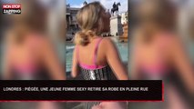 Londres : Piégée, une fille sexy retire sa robe en pleine rue (Vidéo)