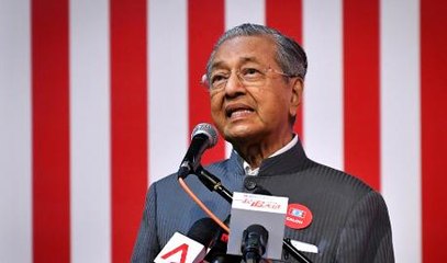 Tun M hints that ‘unhappy’ BN figures will cross over
