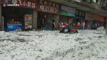 Hailstorm leaves streets in Chinese city covered in thick ice