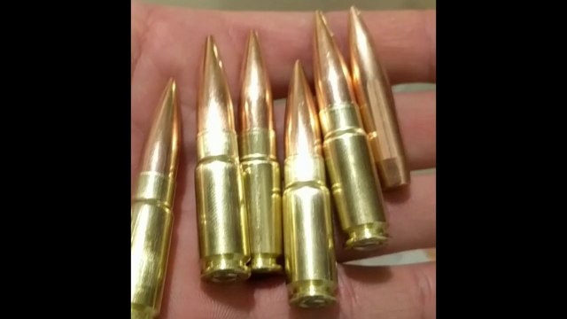 338 Spectre (Loading and Unloading 300 gr. Nosler CC Subsonic Ammo)