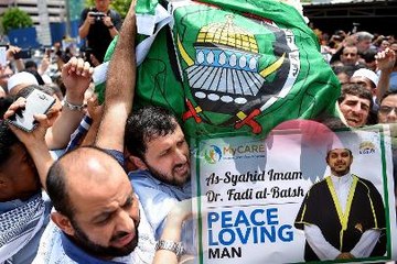 Body of slain Palestinian lecturer sent home to Gaza