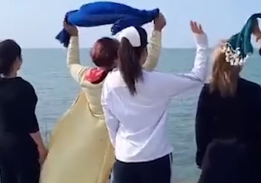 After Video of Violent Confrontation Goes Viral, Women Seen Protesting Iran Law Requiring Hijabs