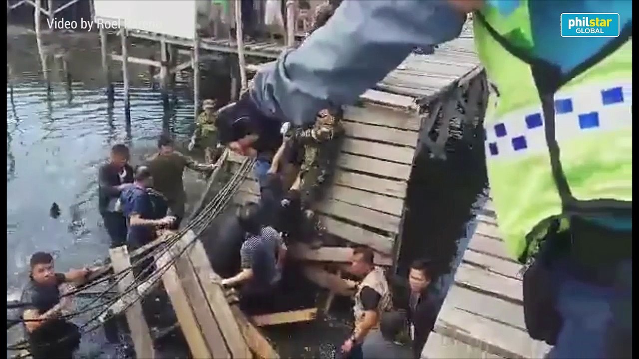 Politicians, officials fell in murky water as wooden bridge collapses