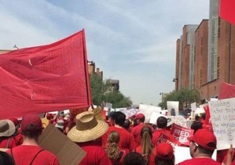 Arizona Teachers in Red March Through Downtown Phoenix