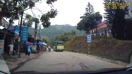 Colliding Motorcyclists Narrowly Avoid Bus