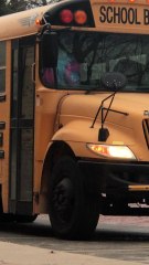 Woman Smoking on School Bus