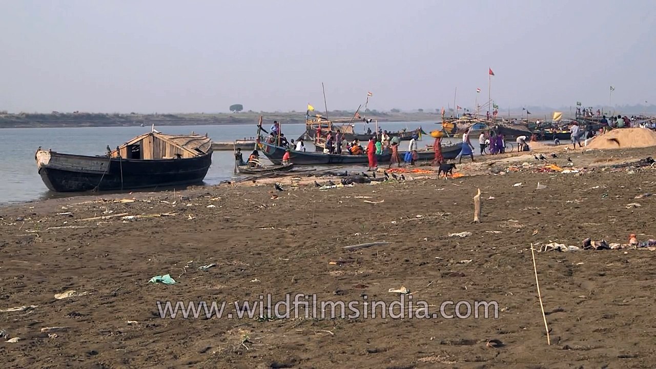 Human Defecation along Ganga- sad shortage of toilets and clean water in India