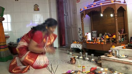 Puja and Ashirwad ceremony at Indian Bengali wedding - women Ullulate