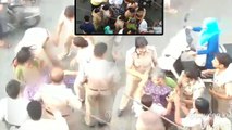 शराब के ठेके का विरोध कर रही महिला की पुलिसकर्मियों से झड़प, बीच सड़क पर हुई अर्धनग्न!