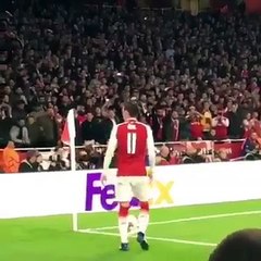 Athletico Fan threw a piece of bread at Ozil, He picked up then kissed it and kept it on the  side