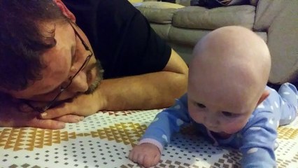 Trying to Teach Jacey how to crawl