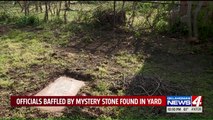 Woman Uncovers Mystery While Doing Yard Work