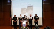 Ketua Polis Negara, Tan Sri Mohamad Fuzi Harun menunjuk satu daripada dua gambar suspek yang menembak mati pensyarah UniKL BMI, Dr Fadi M R Albatsh Fatma pada s