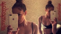 Jennifer Lopez flaunts cleavage in black and white sports bra for risque 'humpday' bathroom selfie