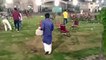 PTI Workers clearing the Jalsa Gah from different waste material after Minar-e-Pakstan Jalsa