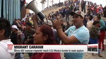'Caravan migrants' reach U.S.-Mexico border