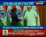 PM Narendra Modi interacts with medal winners of Commonwealth Games 2018 at Lok Kalyan Marg