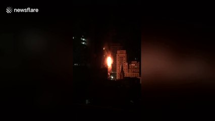 Fire lights up downtown Sao Paulo in 26-storey building blaze