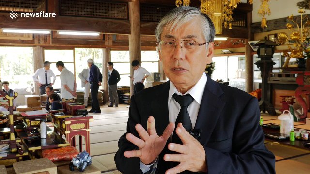 Japan holds Buddhist funeral for more than 100 Aibo robot souls