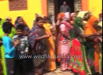 Kids are dipped in cow dung by their parents%2C in this central Indian village